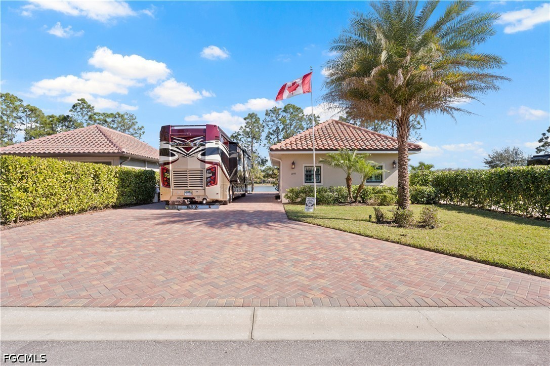 13197  Golden Palms Circle