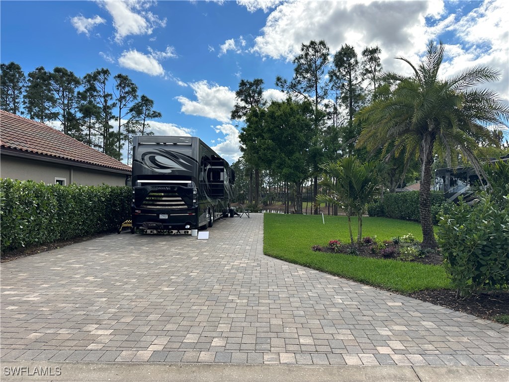 13881  Golden Palms Circle